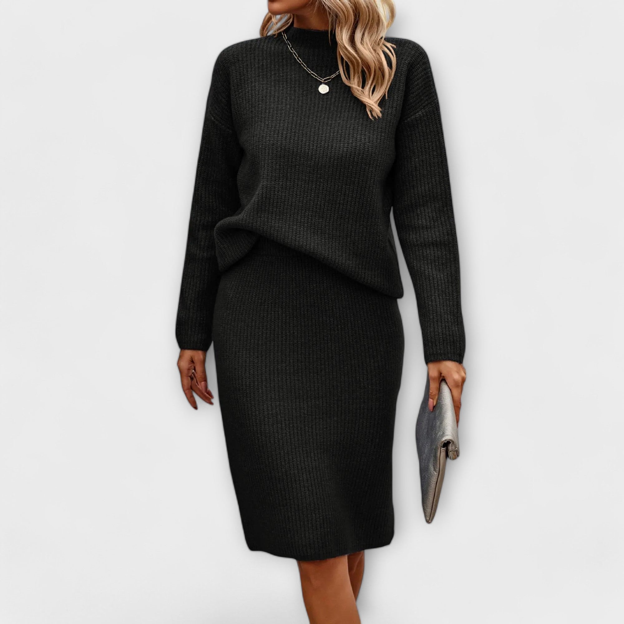 Complète avec un pull et une jupe deux pièces