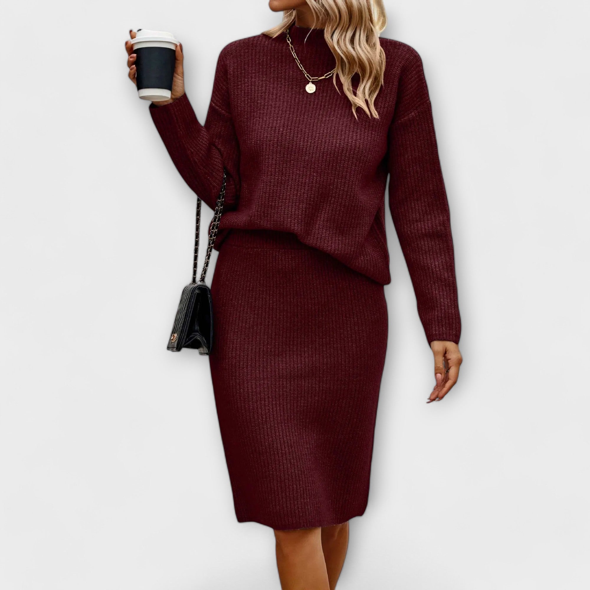 Complète avec un pull et une jupe deux pièces